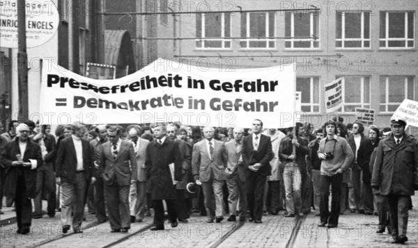 Several hundred journalists and employees of the publishing houses of the newspapers WAZ (Westdeutsche Allgemeine Zeitung) and NRZ (Neue Ruhr-Zeitung) took to the streets in Essen on 27 October 1975 in protest against the merger out of concern for their jobs and press freedom, Germany, Europe