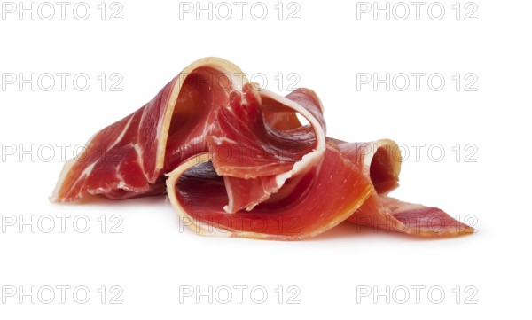 sliced prosciutto on a white background