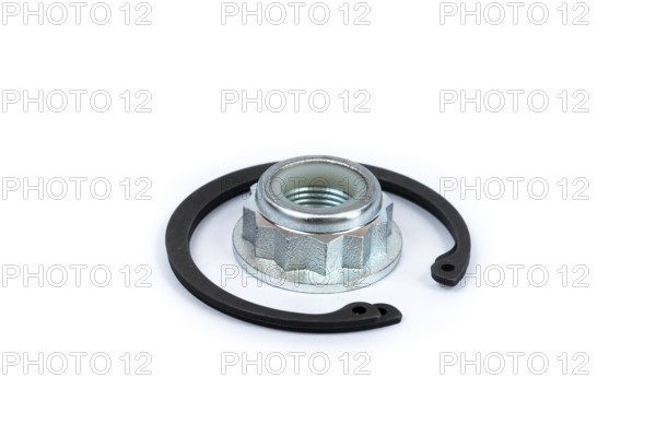 Close-up metal nut with polymer lock and steel locking clip on a white isolated background. Spare parts for car repair