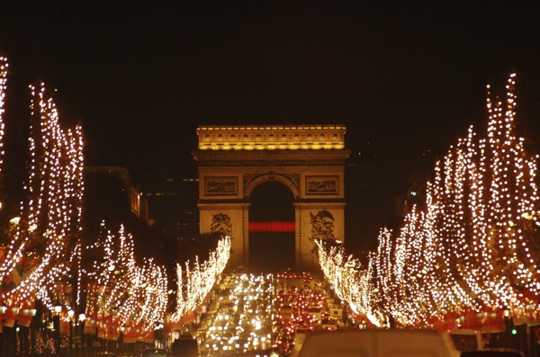 Arc de Triomphe and Christmas illuminations on the Champs Elysees, Paris in France