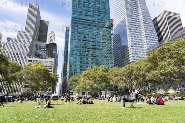 New York, United States of America, September 20, 2019: People on the grass lawn in Bryant Park in Manhattan