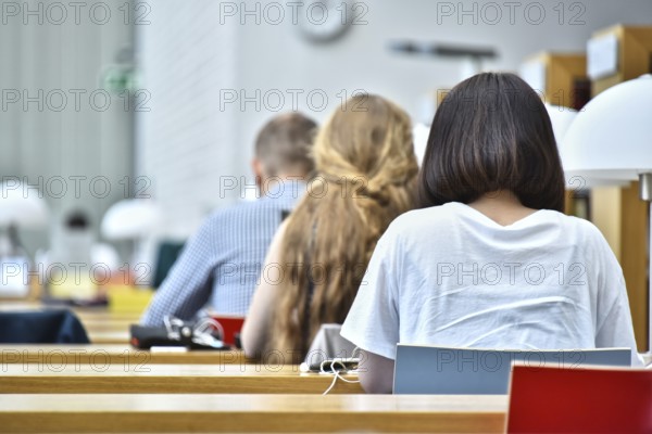 Students reading in a public library