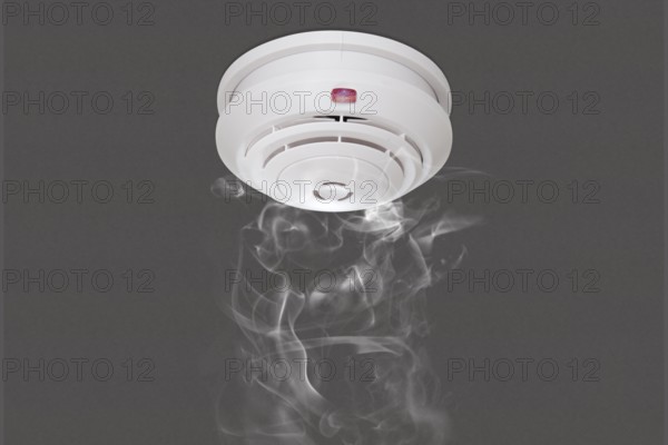 Smoke detector under the ceiling wall