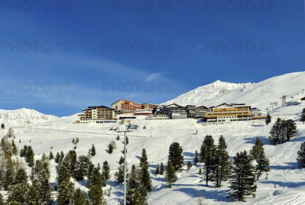 Hotels and Church, Winter, Hochgurgl in Oetztal, Oetztal Alps, Tyrol, Austria, Europe