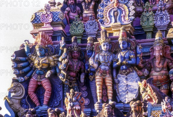 Stucco figures on Meenakshi temple tower in Madurai, Tamil Nadu, South India, India, Asia
