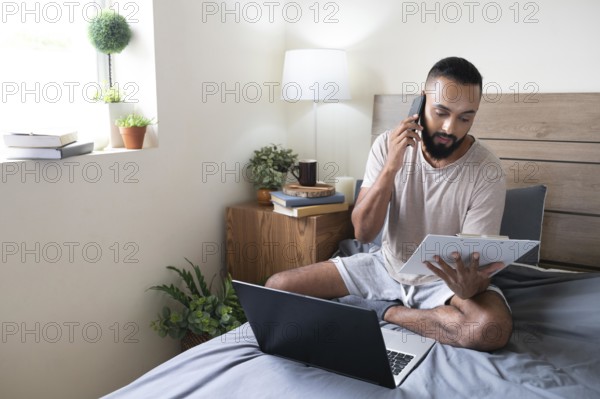 Full shot man working bed