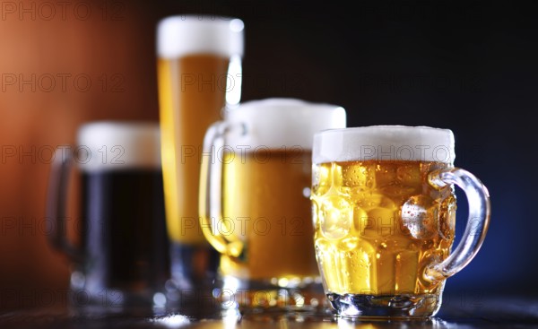Composition with glasses of beer of various kinds