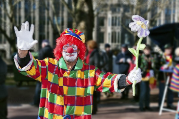 Waving clown on the roadside at the 2011 carnival in Düsseldorf
