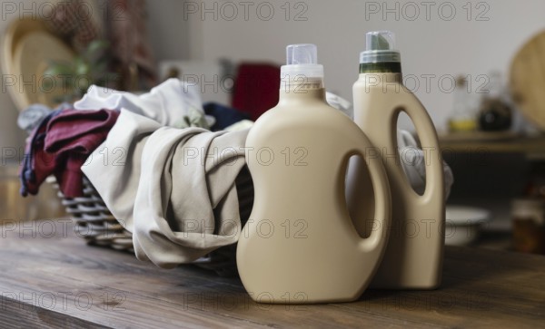 Detergent bottles clothes arrangement. High resolution photo