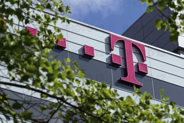 Telekom logo on the façade of the Telekom administration at Heiligengeistfeld in Hamburg, Germany, Europe