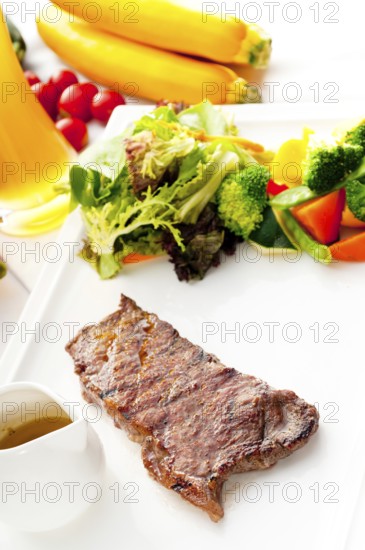 Juicy BBQ grilled rib eye, ribeye steak, vegetables and lagher beer on background, MORE DELICIOUS FOOD ON PORTFOLIO