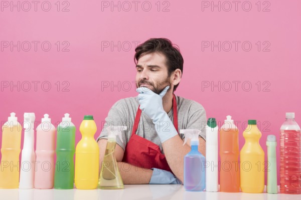 Portrait man with cleaning product