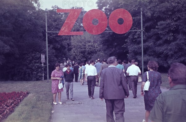 Visitors at the entrance of a zoo, east Germany or former DDR, historical picture, 1960s