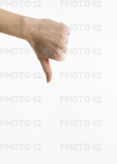 Front view hand showing thumbs down
