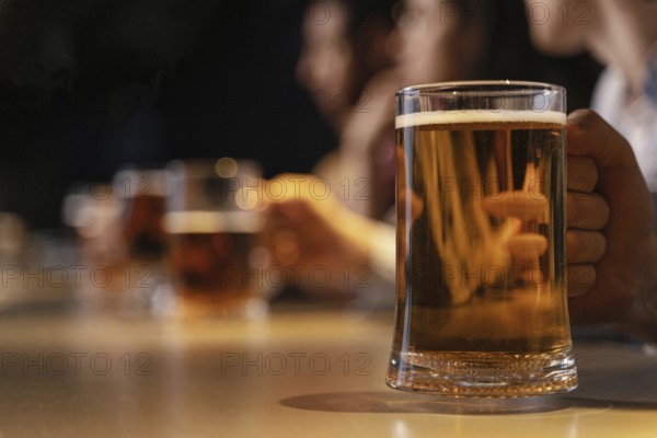 Close up hand holding beer mug. Resolution and high quality beautiful photo