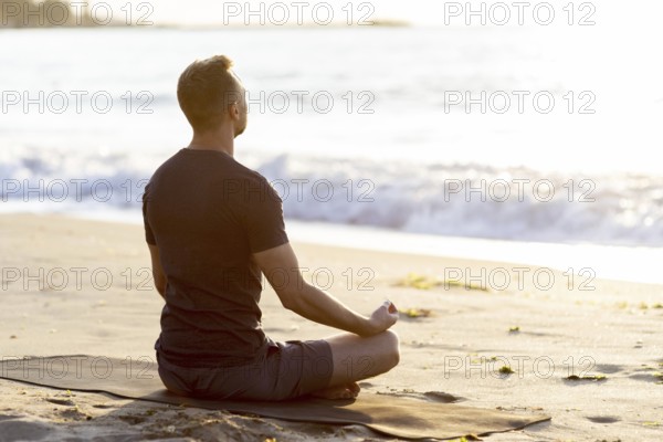 back view man relaxing beach outside. Resolution and high quality beautiful photo