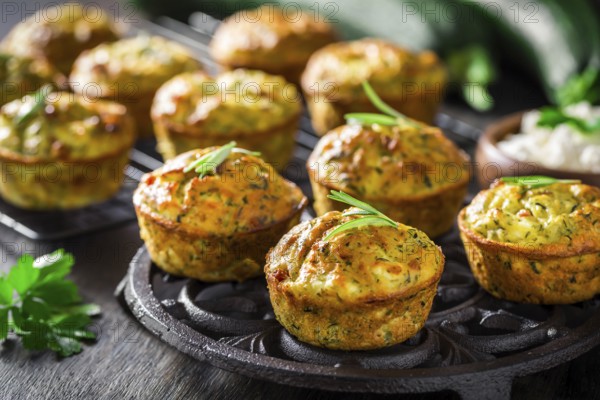 Homemade zucchini muffins with feta cheese, savory courgette with ingredients