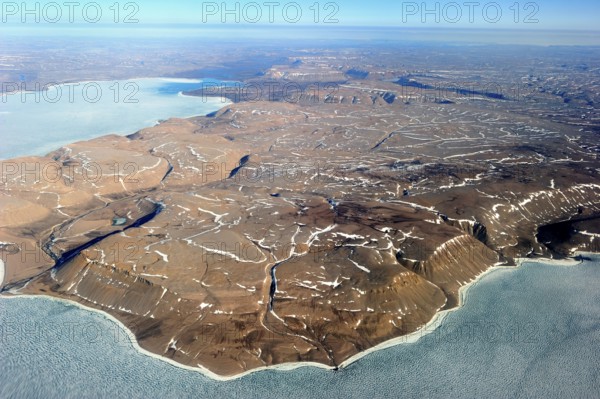 Cliffs and pack ice, Devon Island, Nunavut, Canada, North America