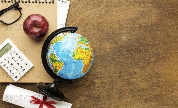 Top view globe with diploma copy space