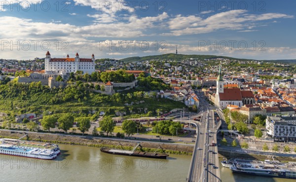 A picture of the landmarks of Bratislava: St. Martin's Cathedral, the Bratislava Castle and the Bridge SNP