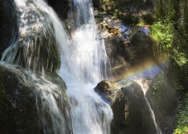 Waterfall at Canyon of Wolfes at Bad Kreuzen Austria with rainbow