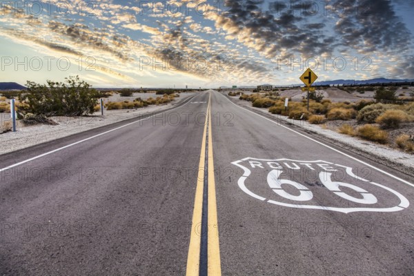 Route 66 in the desert with scenic sky. Classic vintage image with nobody