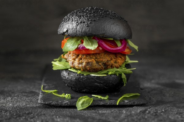 Front view veggie burger with black buns