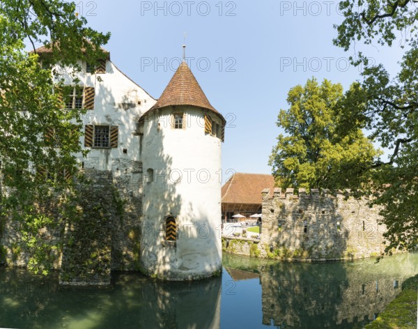 Switzerland - 28 August 2019: horizontal view of the famous Hallwyl Castle on the Aabach River in central Switzerland