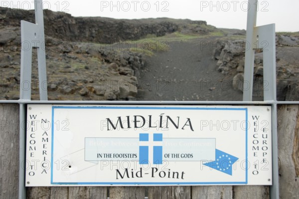 Sign 'Mid-Point', Reykjanes Peninsula, Iceland, Midlina, midpoint between the European and American plates, tectonic plate displacement, Europe