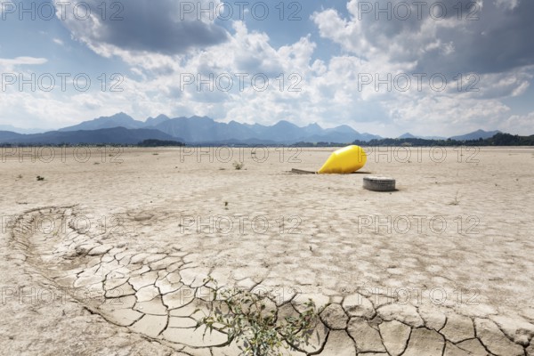 Buoy in the waterless Forggensee in Ostallgäu, Germany, Europe