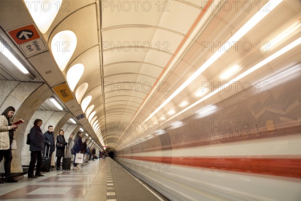 Prague, Czech Republic, March 20, 2017: People waiting for the subway at Andel metro station, Europe