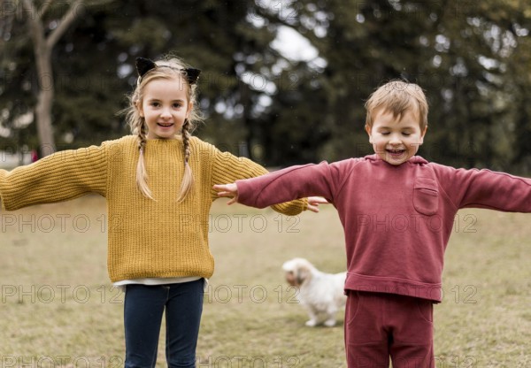 Front view smiley kids playing