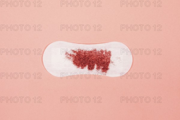 Sanitary towel with glitter