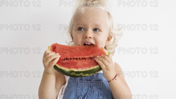 Adorable baby playing with food 2