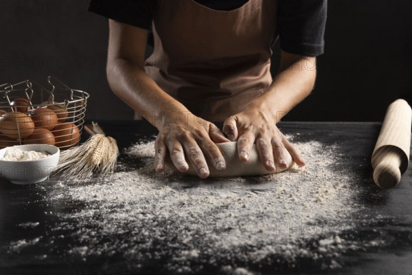 Chef rolling dough table