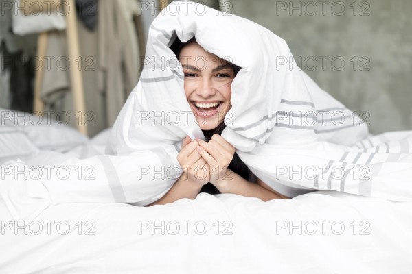 Portrait beautiful woman happy bed