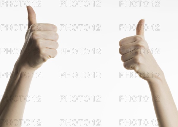 Front view hands showing thumbs up. Resolution and high quality beautiful photo