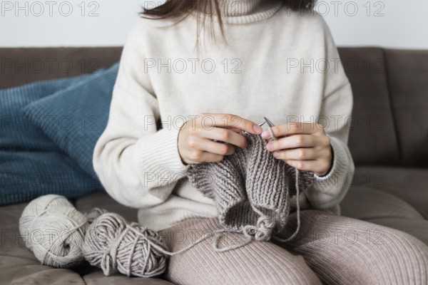 Woman home knitting close up 8