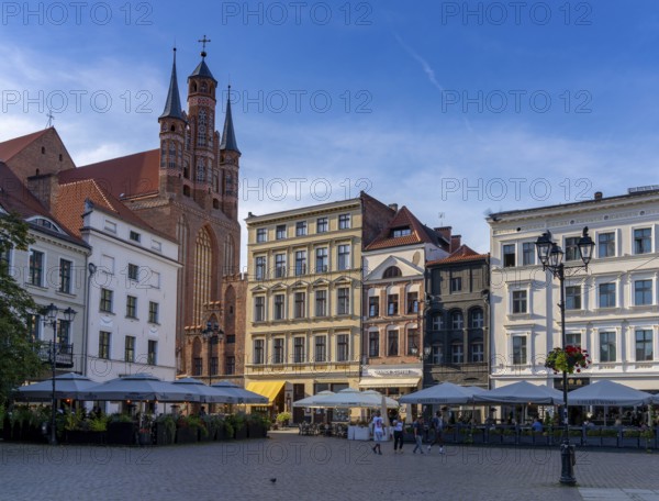 Torun, Poland - 6 September, 2021: view of the main square in historic old town of Torun with Saint Mary's church