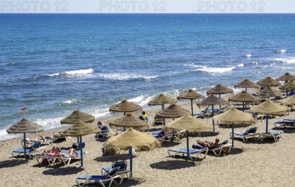 MARBELLA, ANDALUCIA/SPAIN - MAY 4 : View of the beach in Marbella Spain on May 4, 2014. Unidentified people