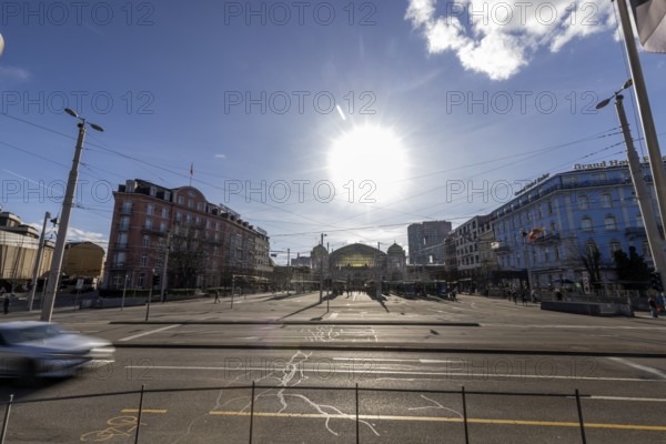 Sun is low over the main railway station, SBB railway station, Centralbahnplatz, Basel, Canton of Basel-Stadt, Switzerland, Europe