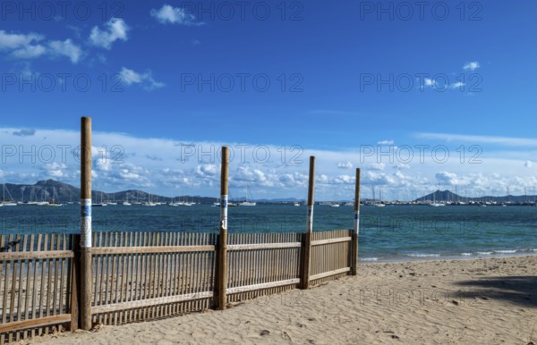 On the beach of Port de Pollença or Pollensa, Serra de Tramuntana, Majorca, Balearic Islands, Spain, Europe