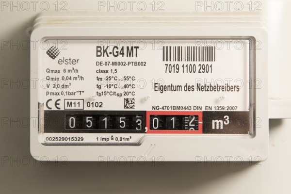 Symbolic image of energy costs in the household, natural gas, analogue gas meter in a flat, Hamburg, Germany, Europe