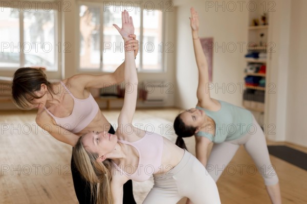 female yoga teacher teaching class 1