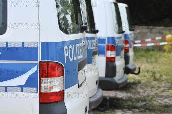 Parked police car during a police operation
