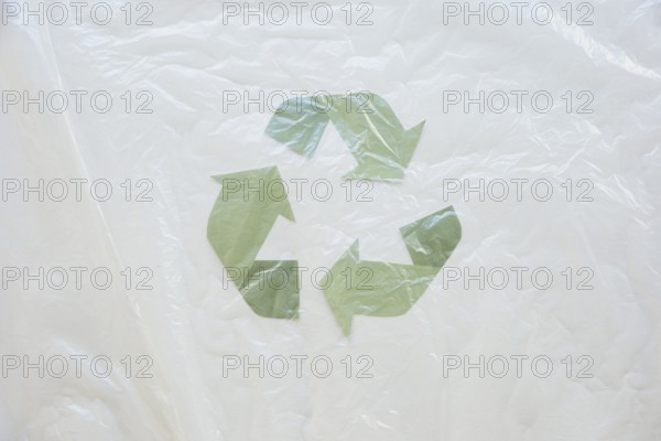 Recycle symbol with oilcloth