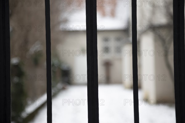 Grille with building in the background, Freiburg im Breisgau, Baden-Württemberg, Germany, Europe