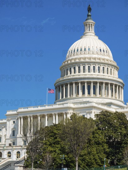 The United States Capitol building with American flag