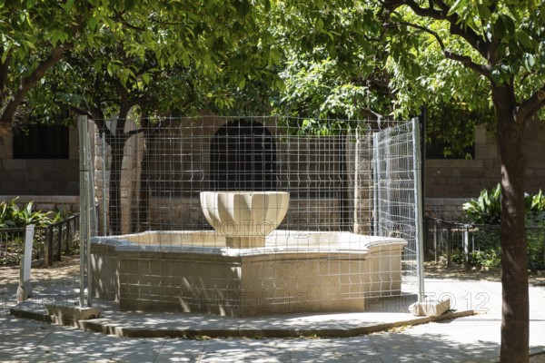 Closed fountain due to lack of water in a public garden in Barcelona, Spain, Europe