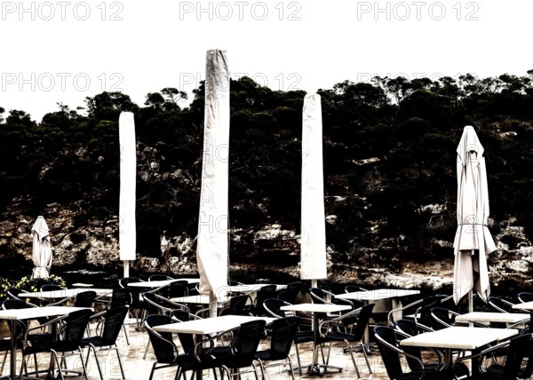Empty restaurant terrace in the low season in Cala Figuera near Santanyí, Majorca, Balearic Islands, Spain, Europe